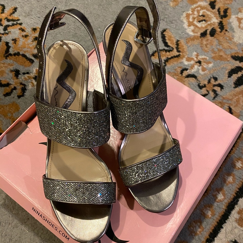 Silver high sandals.
